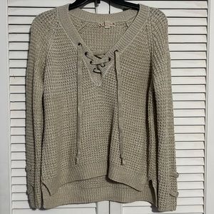 tan sweater